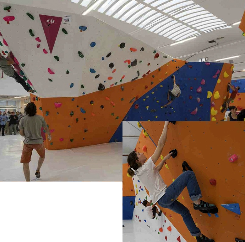 grupo de hombres y mujeres escalando en muro indoor